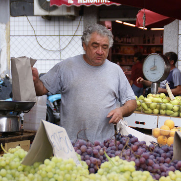 Seller at piazza Carlo Alberto